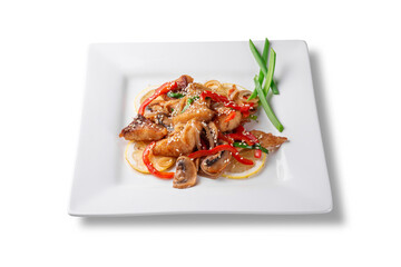 Flat lay of crispy fried fish fillet served with sautéed vegetables: red bell pepper, mushrooms and onion. Topped with sesame seeds and garnished with lemon slices and green onion
