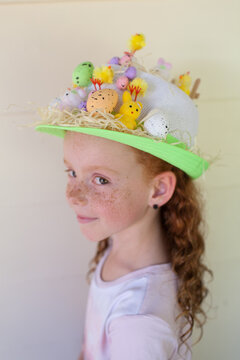 Young girl wearing an Easter hat