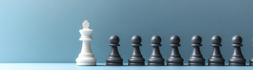Strategic chess move indoor setting photography minimalist background close-up focus concept of determination
