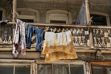 Laundry hangs to dry in an old wooden house, Tbilisi, Georgia