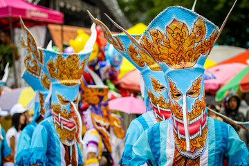 Phi Ta Khon is the name of performance in which performers wear scary and ugly but colorful masks,...