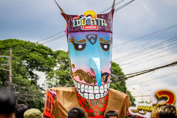 Phi Ta Khon is the name of performance in which performers wear scary and ugly but colorful masks,...