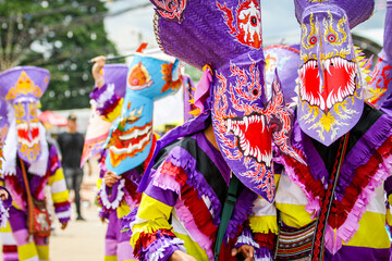 Phi Ta Khon is the name of performance in which performers wear scary and ugly but colorful masks,...