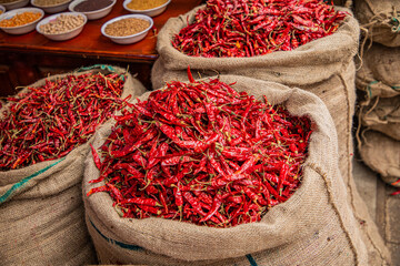 Several varieties of tropical vegetables neatly arranged for sale