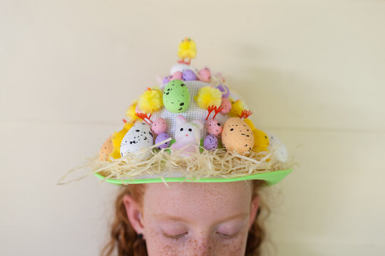 Young girl wearing an Easter hat