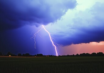 Dramatic Lightning Strike Illuminates Stormy Sky at Dusk