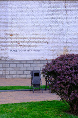 red brick wall with flowers