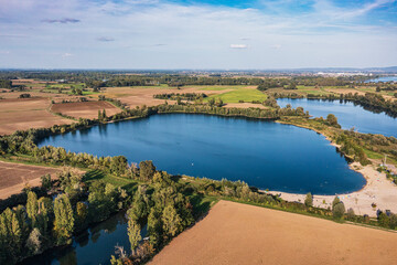 Fototapeta premium Top view of a lido at a swimming lake near Eich in Rheinhessen