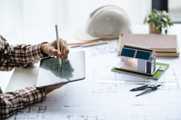 Interior architecture or engineer working on blueprint and planning projects