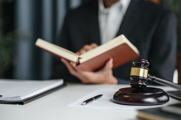 lawyer or judge counselor reading a important legal contract documents in office