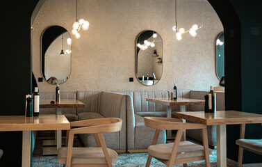 Modern Restaurant Interior with Stylish Lighting and Mirrors
