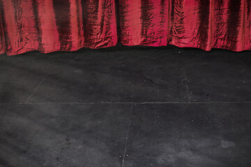 Stage with red curtains background. Closed theatre curtain before entertainment presentation