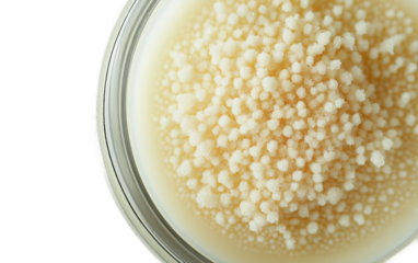 Detailed close-up view of a textured facial scrub with natural granules offering effective skin exfoliation and deep cleansing properties for radiant skin isolated on transparent background PNG