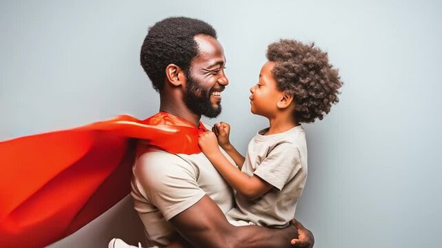Father and Son Superhero Bonding: A heartwarming portrait of a father and son sharing a tender moment, with the father draped in a superhero cape, embodying strength and protection.
