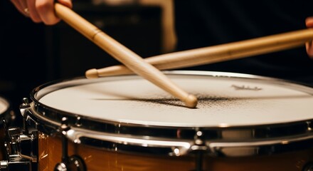 Obraz premium Close-up of a Drummer's Hands Playing Snare Drum