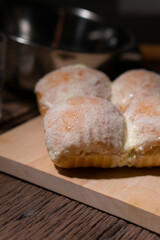 Modern bakery with many ingredients such as wheat flour, sugar, eggs, grains, fruit, butter, milk.