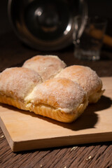 Modern bakery with many ingredients such as wheat flour, sugar, eggs, grains, fruit, butter, milk.