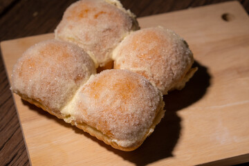 Modern bakery with many ingredients such as wheat flour, sugar, eggs, grains, fruit, butter, milk.