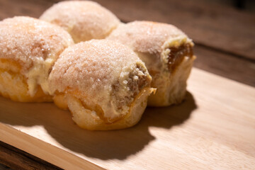 Modern bakery with many ingredients such as wheat flour, sugar, eggs, grains, fruit, butter, milk.