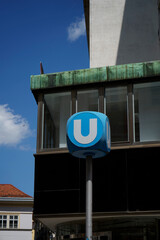 Fototapeta premium Iconic Vienna U-Bahn signs captured in various city angles. The bold blue 