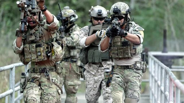 A squad of elite special forces soldiers on a mission in a rugged desert environment A concept for modern warfare tactical operations and global security