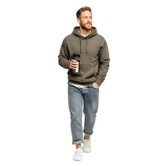 A man in a hoodie and jeans walks forward while holding a bottle