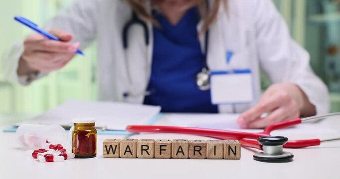 A dedicated medical professional meticulously prepares Warfarin, an essential and vital anticoagulant medication