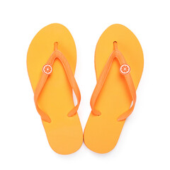 Stylish orange flip flops isolated on white, top view. Beach accessory
