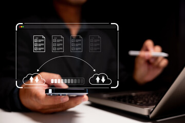 A person uses a smartphone and laptop with a digital interface showing cloud-based file sharing and...