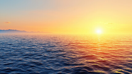 Obraz premium Golden sunset over calm sea creates serene atmosphere, reflecting warm colors on water surface