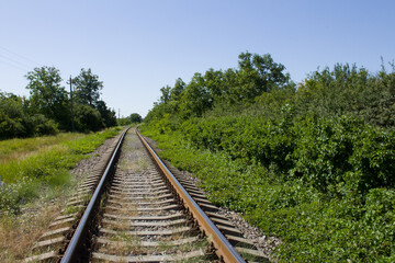 Fototapeta premium Train tracks in the grass
