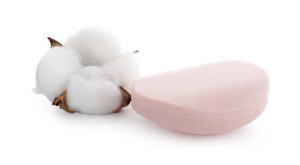 Soap bar and cotton flower isolated on white