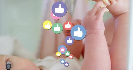 Baby girl reaching feet in crib, forming social thumbs-up icons drifting limbs showing discovery