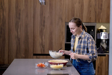A skilled chef prepares a vibrant, delicious dish in a modern kitchen, showcasing impressive...