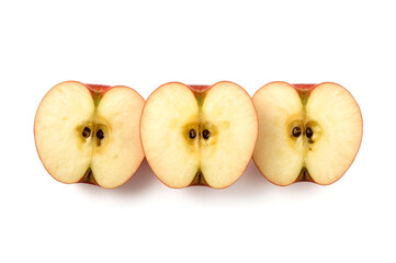 A top-down view of three cross-sections of red apples arranged horizontally Each slice showcases the detailed core with visible seeds and the vibrant red skin