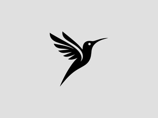 Fototapeta premium Minimalist hummingbird silhouette vector logo for eco-friendly or garden brands 