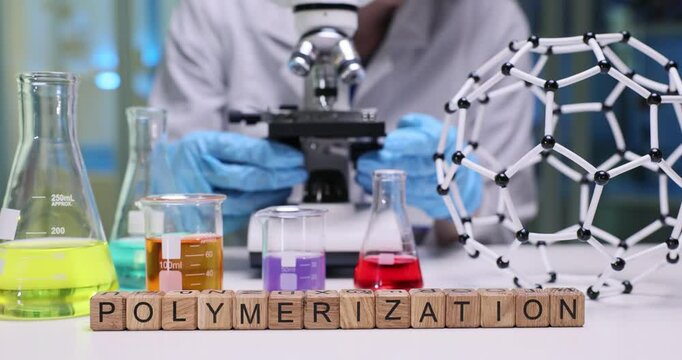 Explore polymerization techniques in the lab with vibrant reagents and modern microscopy for analysis
