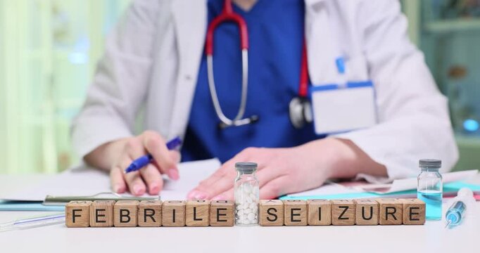 In a clinical setting, a medical professional conducts a comprehensive discussion on febrile seizures, using visuals