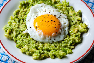 Healthy Fried Egg On Mashed Avocado Meal