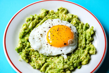 Healthy Fried Egg On Mashed Avocado Meal