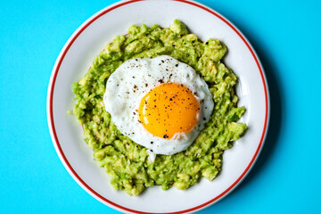 Healthy Fried Egg On Mashed Avocado Meal