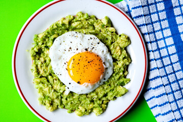 Healthy Fried Egg On Mashed Avocado Meal