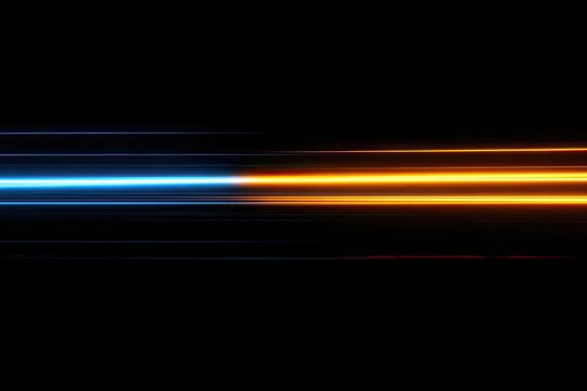Two parallel light streaks, blue and orange, on black background