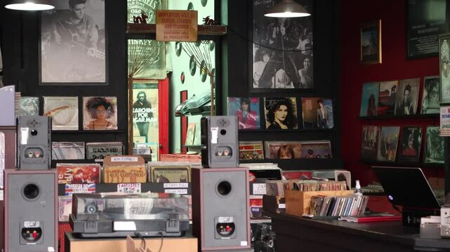 Interior view of a colorful local art and music store with a local collection of old songs