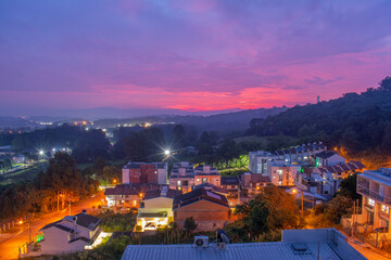 pink sunset with city lights