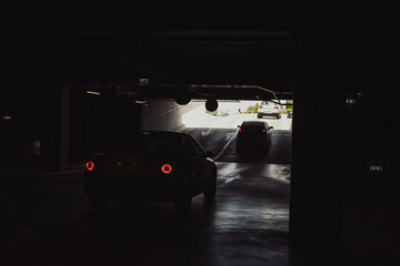Empty parking lot with overhead dim light