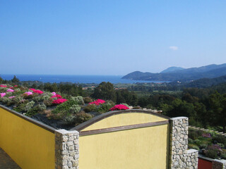 Panoramic distant view of the sea from the island of Elba, Italy, where the deep blue waters...