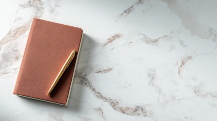 Minimal workspace composition with brown leather notebook and golden pen on marble background in soft daylight ideal for journaling visuals, personal branding and elegant editorial design