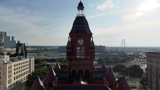 Dallas County Courthouse with a clock tower, surrounded by Dallas city architecture