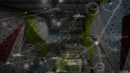 Static climbing gym view fading into tech network overlay mapping holds near climber silhouette - Powered by Adobe